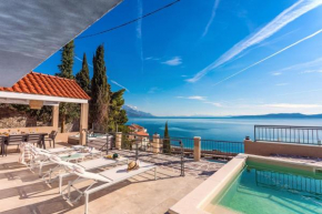 Villa Perla Blu with 4 bedrooms, heated pool, jacuzzi, 50m from beach